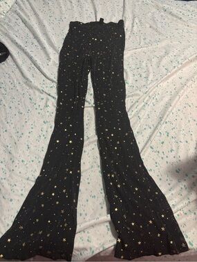 SHEIN Black Flared Pants with Gold Star Print